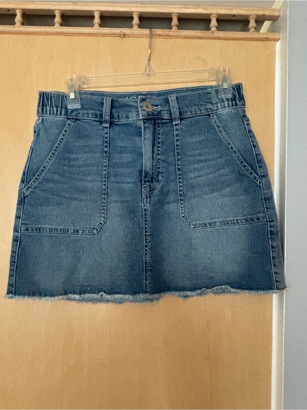 No Boundaries Denim Mini Skirt in Medium Blue with Raw Hem